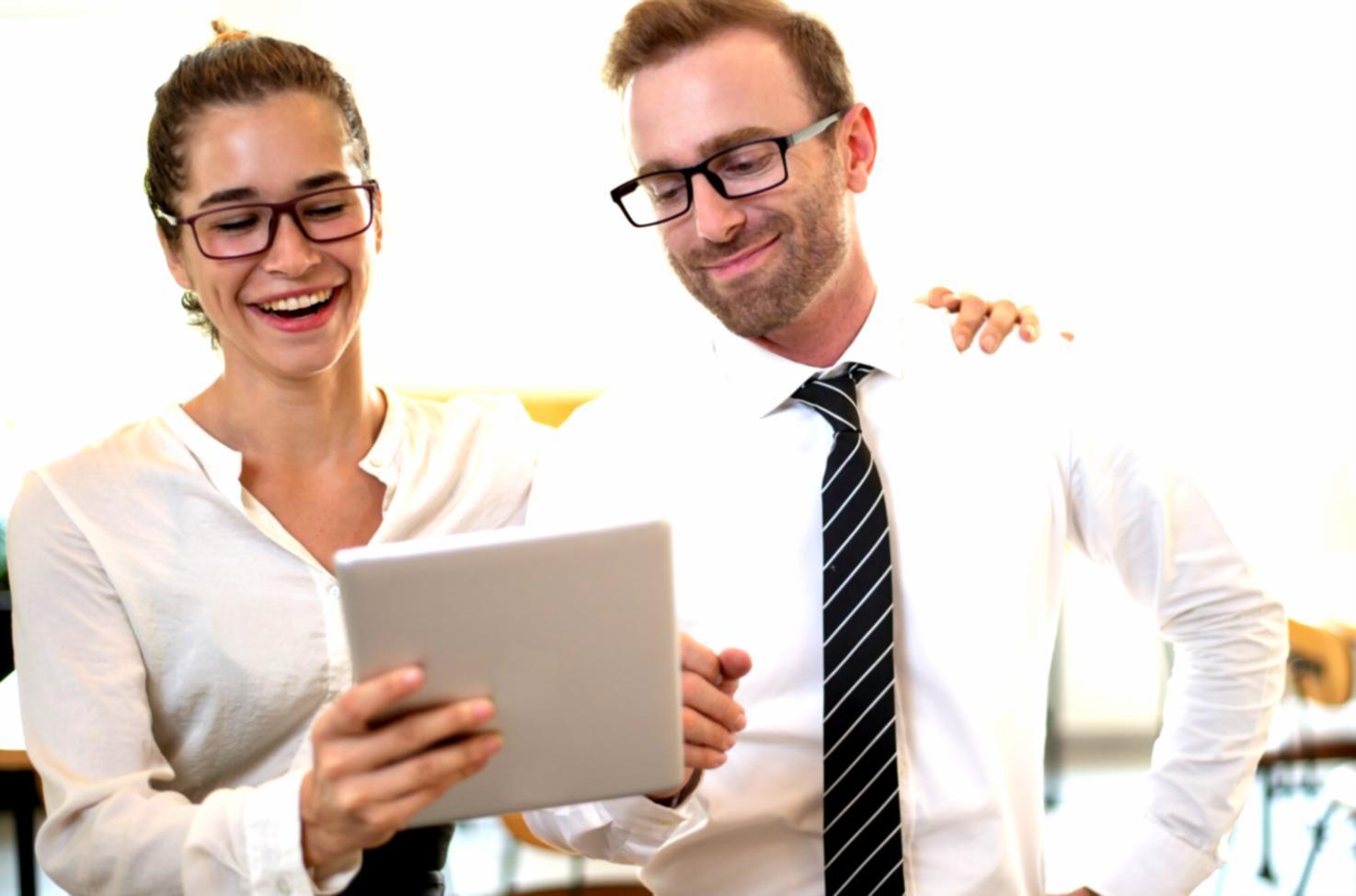 Investment automation workspace with multiple screens showing market data and algorithmic trading patterns